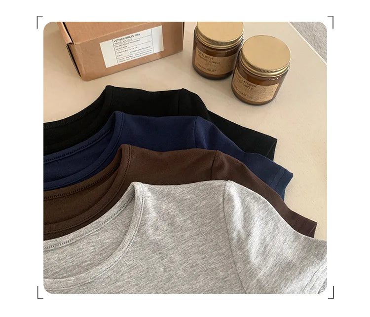 T-shirt court basique uni à manches courtes et col rond pour femme