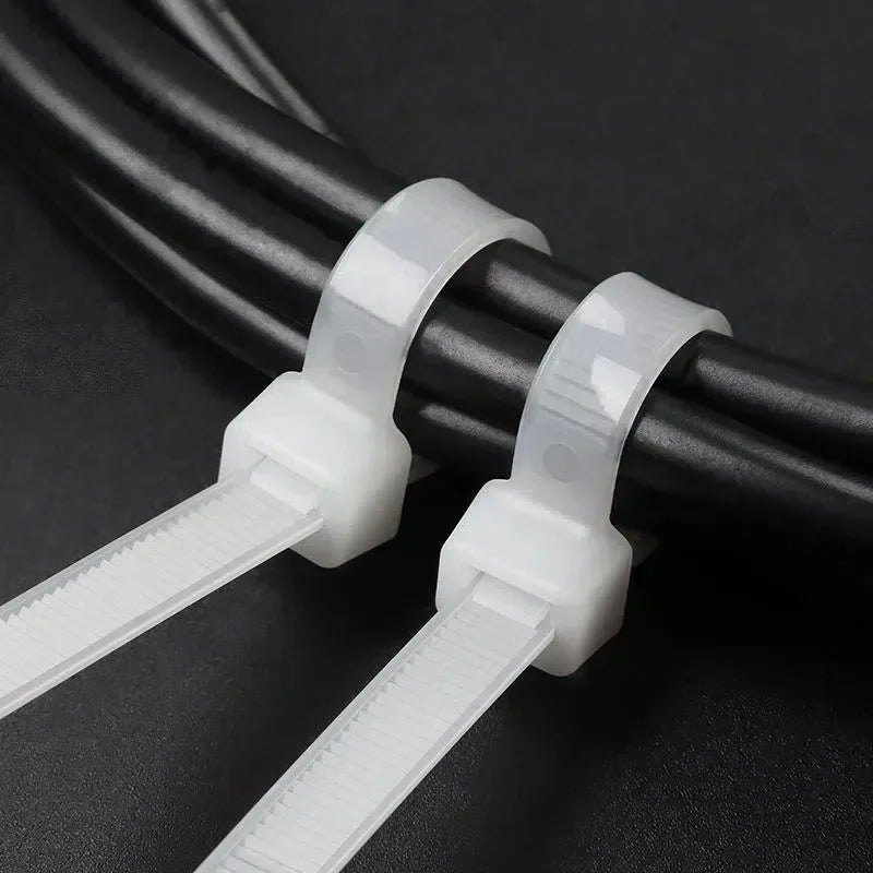 Lot d'attaches de câble en nylon autobloquantes, sangles réglables, pinces de fixation en plastique résistantes à la chaleur.